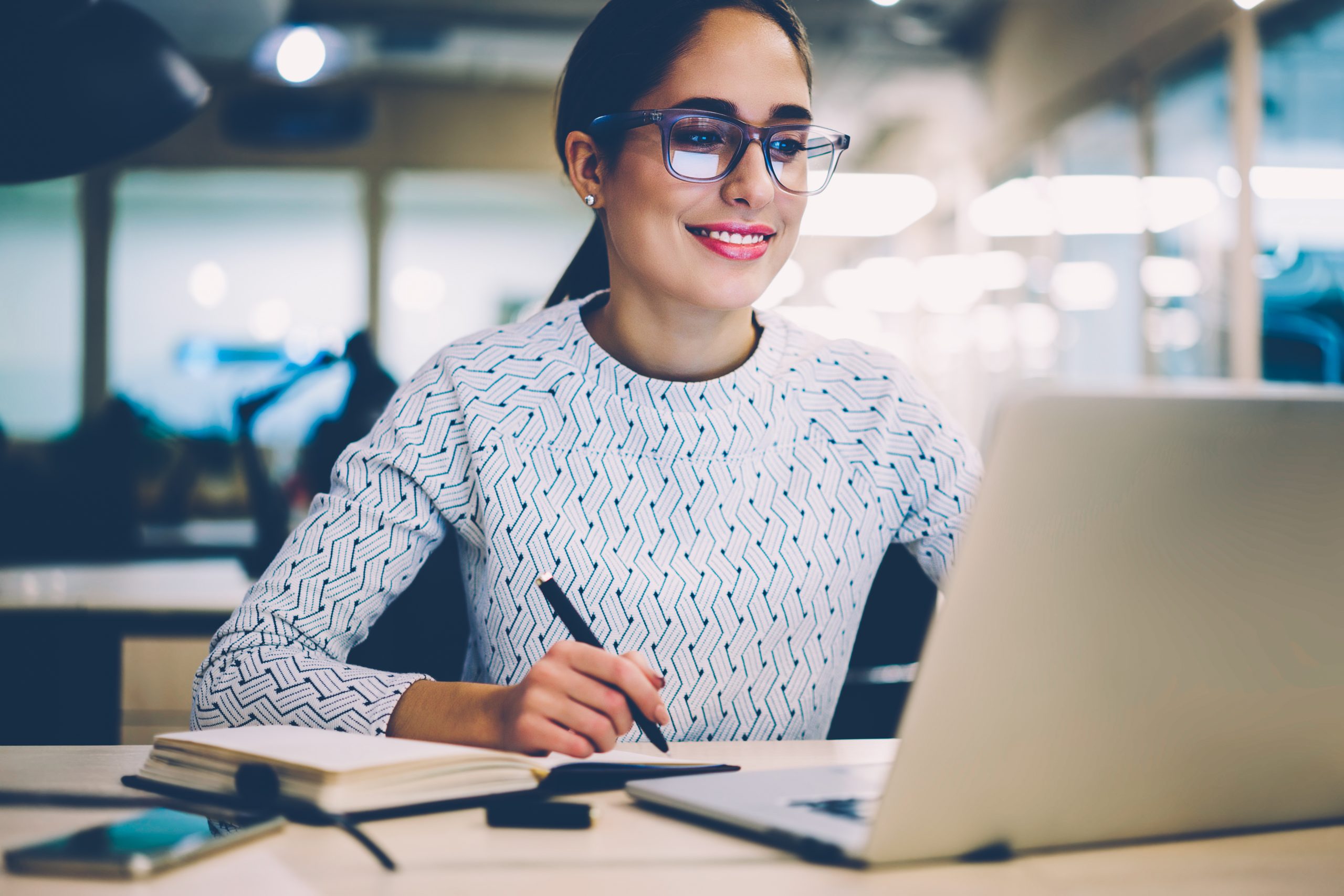 woman staring at laptop